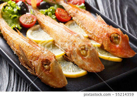 Delicious fresh fried saltwater fish gurnard with 55214359