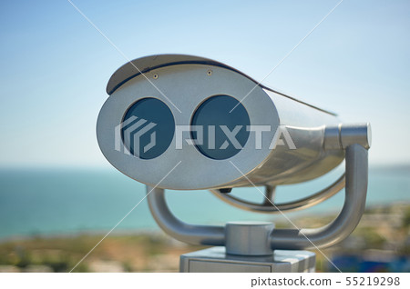 Binoculars on the observation deck overlooking the sea 55219298