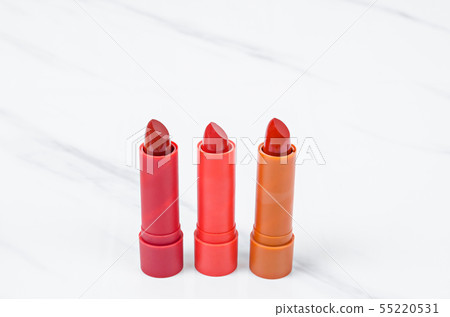 Collection red lipsticks on marble. 55220531