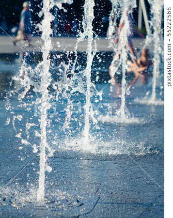 Water drops from dry fountain splashing on granite 55222568