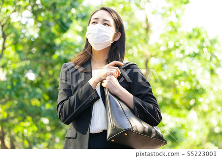Business woman in a mask Business woman in a mask 55223001