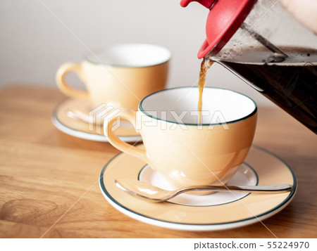 Coffee time Two cups poured from coffee press b Coffee time Two cups poured from coffee press b 55224970