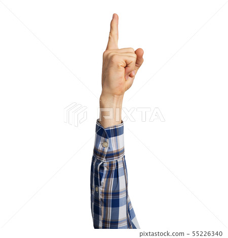 Man hand in blue checkered shirt showing finger 55226340