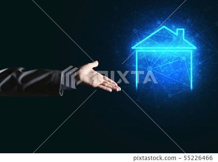 Conceptual image with hand pointing at house or main page icon on dark background 55226466