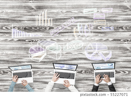 Top view of businesspeople sitting at table and using gadgets Top view of businesspeople sitting at table and using gadgets 55227071