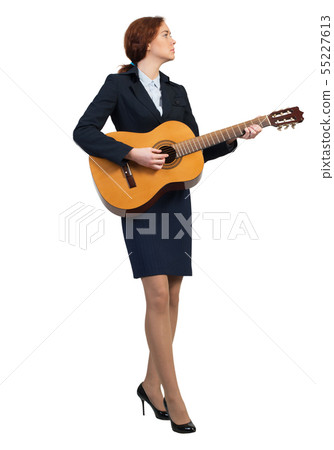 Businesswoman with guitar 55227613