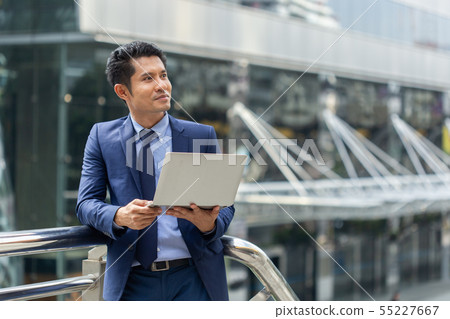 asian businessman portrait with laptop. asian businessman portrait with laptop. 55227667