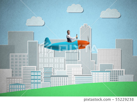 Businessman sitting in small propeller plane 55229238