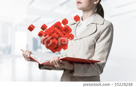 Woman showing geometric 3d cubes 55229288