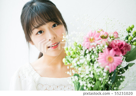 Young woman and flower Young woman and flower 55231020