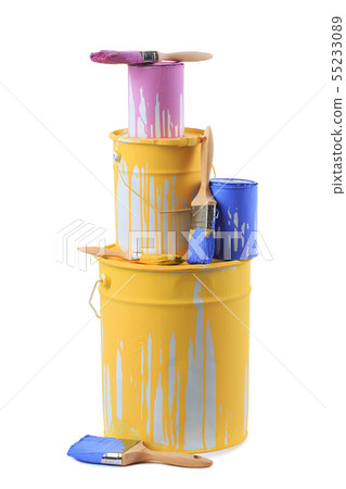 Open cans of paint in different colors and brushes.  55233089
