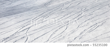 Snowy ski slope for freeride with trace from skis Snowy ski slope for freeride with trace from skis 55235100