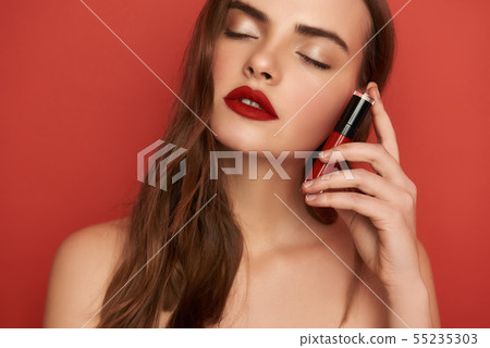 Handsome young man in shirt sitting in the car 55235303