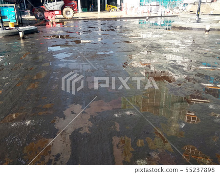 Waterproofing membrane applied by workers Waterproofing membrane applied by workers 55237898