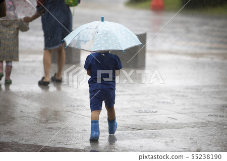 Children going on the rain with umbrellas Children going on the rain with umbrellas 55238190