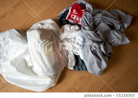 Laundry placed on the floor 55238303
