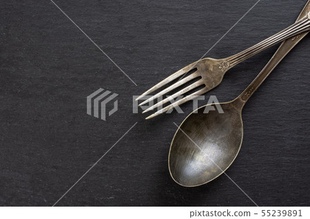 Raw macaroni pasta on grey stone Raw macaroni pasta on grey stone 55239891