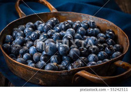 Fresh blueberries in copper dishes. Healthy food Fresh blueberries in copper dishes. Healthy food 55242511