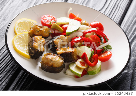 Delicious fish fried European eel with fresh Delicious fish fried European eel with fresh 55243487