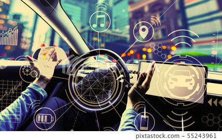 Person using a car in autopilot mode 55243961