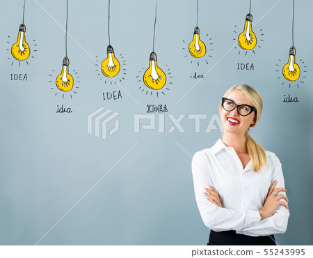 Idea light bulbs with young woman 55243995