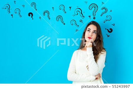Question marks with young woman 55243997