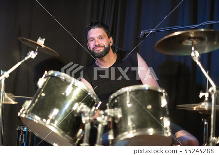 Musician Playing Drums And Cymbals At Concert. Musician Playing Drums And Cymbals At Concert. 55245288