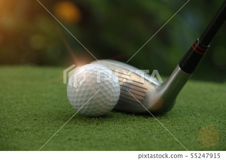 Golf ball and golf club in beautiful golf course a Golf ball and golf club in beautiful golf course a 55247915