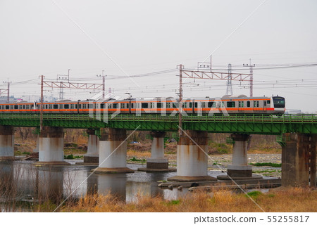 Chuo Line passing the Tama River Bridge Chuo Line passing the Tama River Bridge 55255817