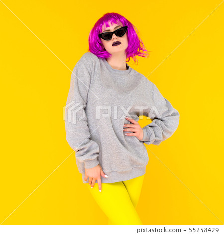Fashion girl portrait on yellow background. Crazy Fashion girl portrait on yellow background. Crazy 55258429