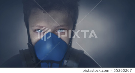 Young boy wearing gasmask, respirator portrait Young boy wearing gasmask, respirator portrait 55260267
