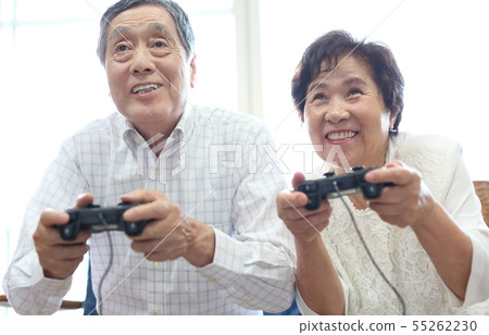 Senior image enjoying video games Senior image enjoying video games 55262230