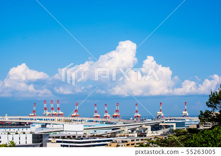 Harbor cranes and incoming clouds 55263005