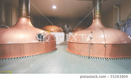 Equipment for preparation of beer. Lines of cooper tanks in brewery. Manufacturable process of 55263804