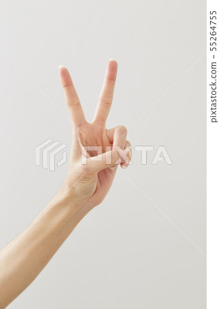 Woman hand showing peace two on white Woman hand showing peace two on white 55264755