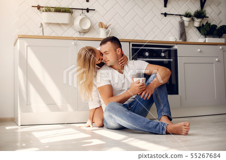Beautiful couple spend time in a kitchen 55267684