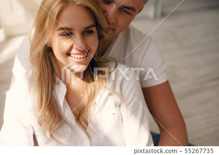 Beautiful couple spend time in a kitchen Beautiful couple spend time in a kitchen 55267735