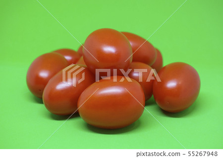 Red tomatoes on green background. Vegetables Red tomatoes on green background. Vegetables 55267948