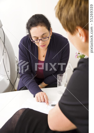 Consultation of client at body shape clinic Consultation of client at body shape clinic 55269389