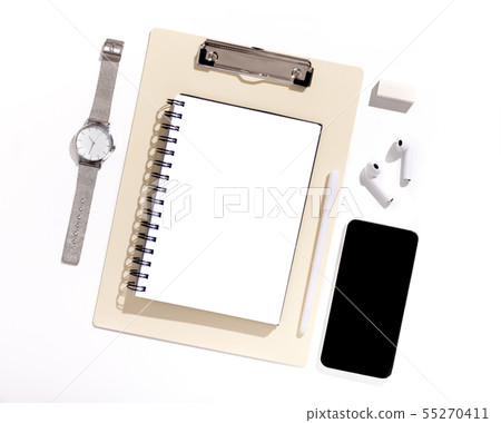 Cellphone with black blank screen on Office table with supplies 55270411
