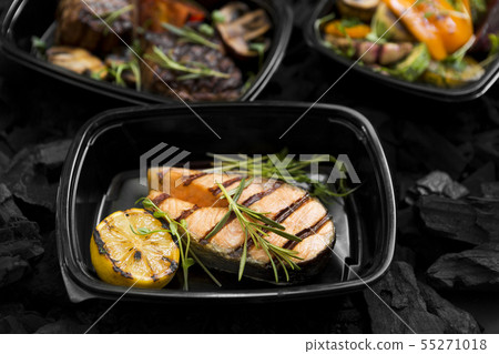 Grilled fish for healthy nutrition in take away box 55271018