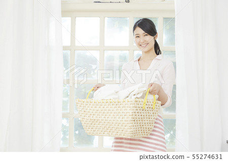 Smiley female washing 55274631