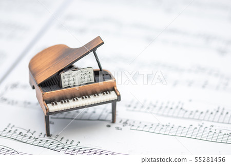 Grand piano and sheet music Indoor studio photography 55281456