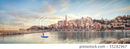 Public beach of Menton old town at sunset 55282967