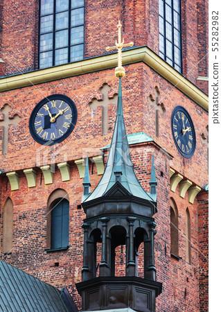 old church with clock, Stockholm 55282982