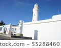 White post and white lighthouse 55288460