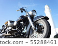 Motorcycle, white lighthouse and blue sky 55288461
