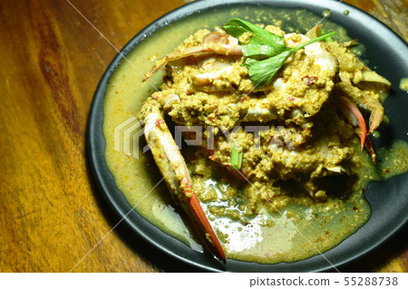 stir fried flower crab in yellow curry on plate 55288738