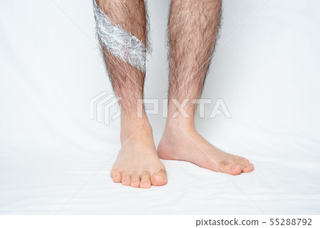 Image which applied hair removal cream to a part of men's leg hair removal Image which applied hair removal cream to a part of men's leg hair removal 55288792