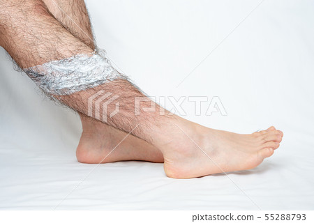 Image which applied hair removal cream to a part of men's leg hair removal Image which applied hair removal cream to a part of men's leg hair removal 55288793